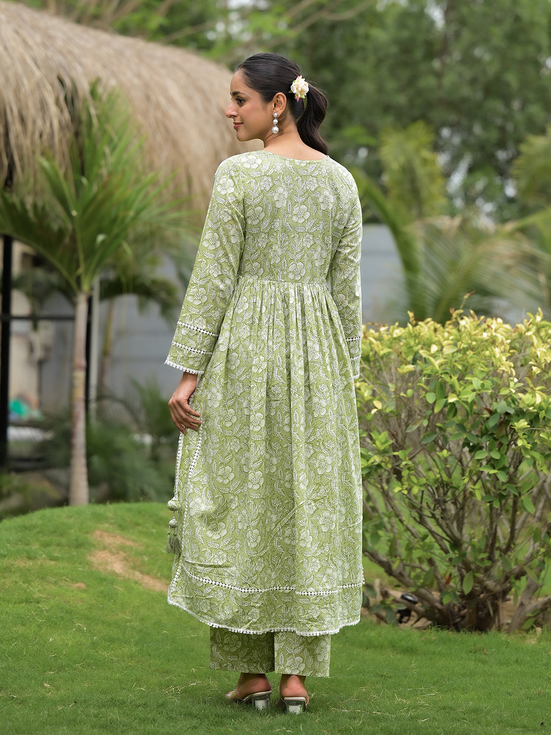 Light green floral print cotton Nyra Cut Kurta Pant Set with long sleeves and flared skirt