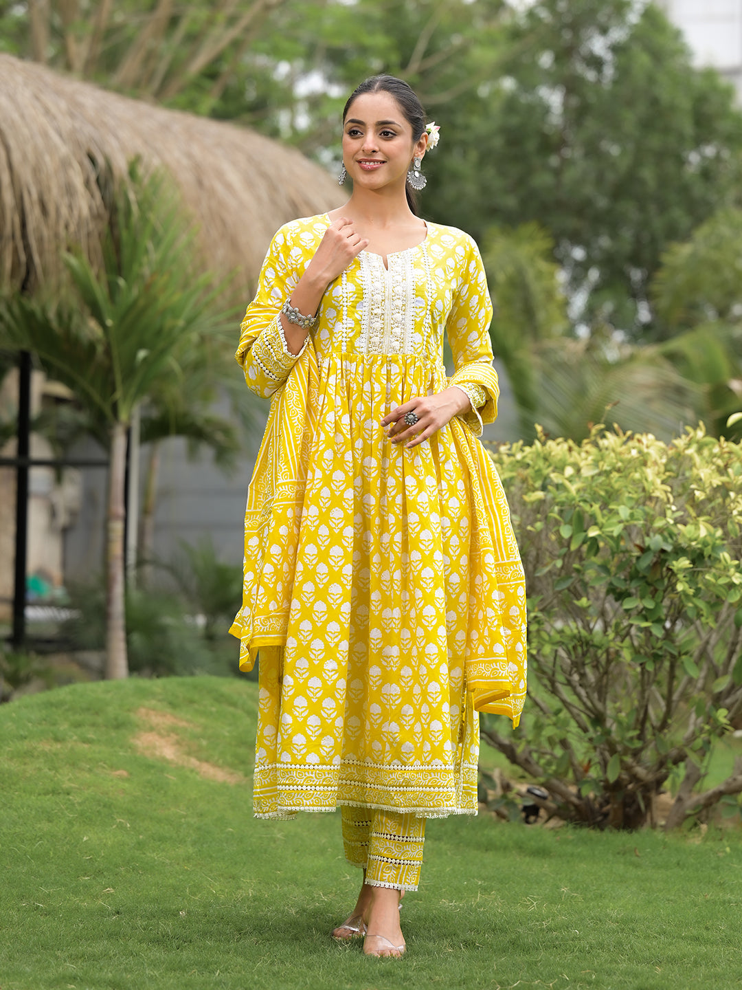 Bright yellow floral print cotton kurta pants set with intricate embroidery and dupatta