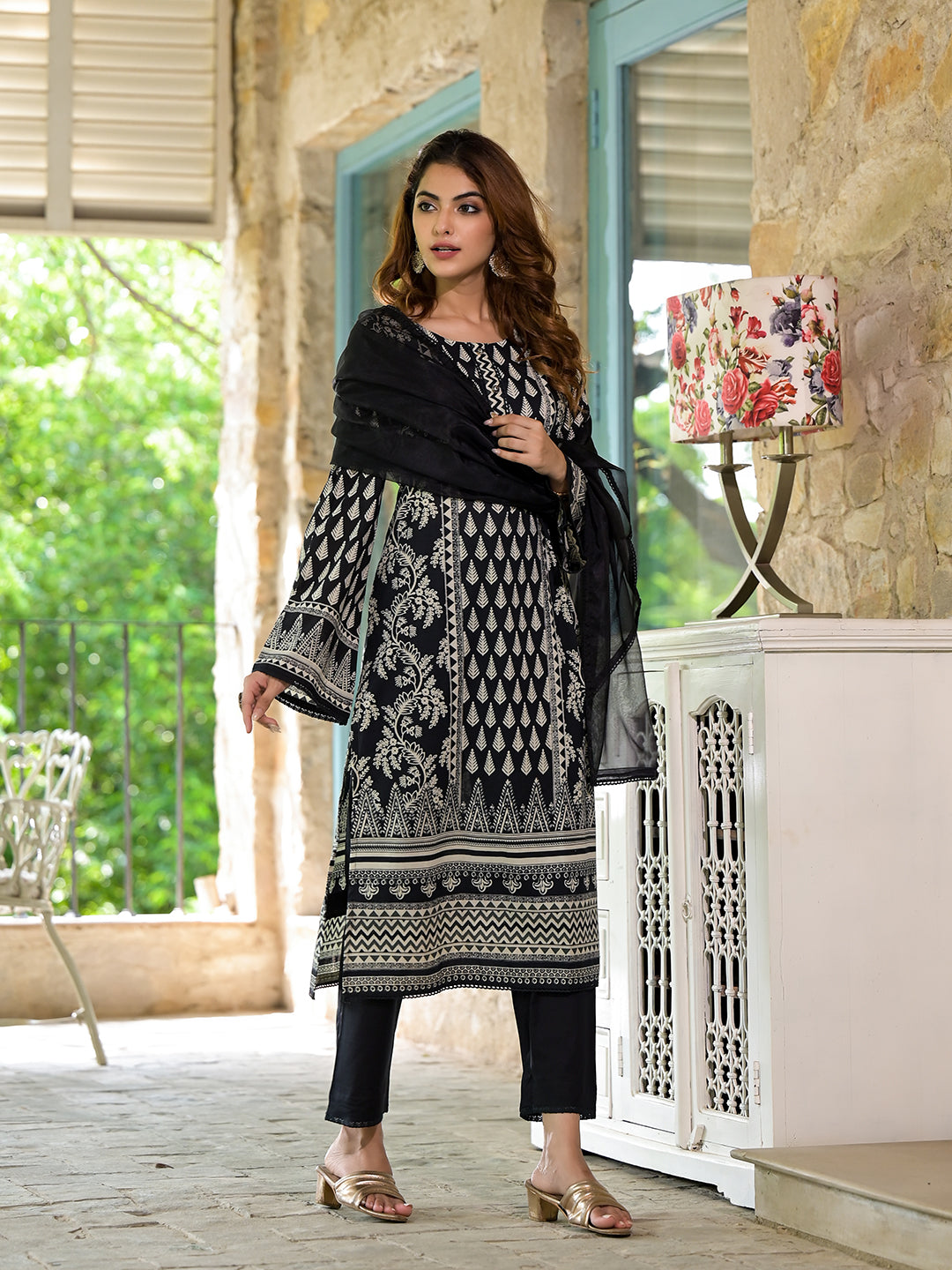 Intricately patterned black cotton straight fit knee long kurta set for women