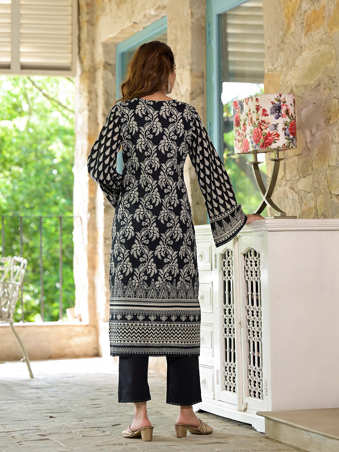 Long-sleeved black cotton straight fit knee long kurta set worn by a model