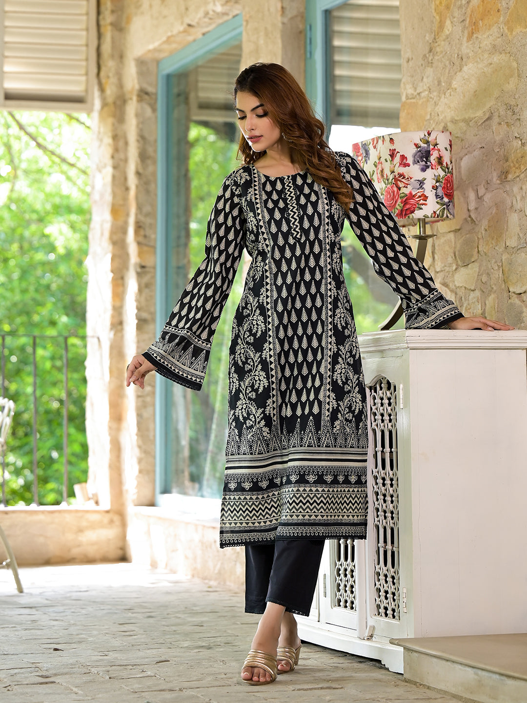 Long-sleeved black cotton straight fit knee long kurta set with intricate designs