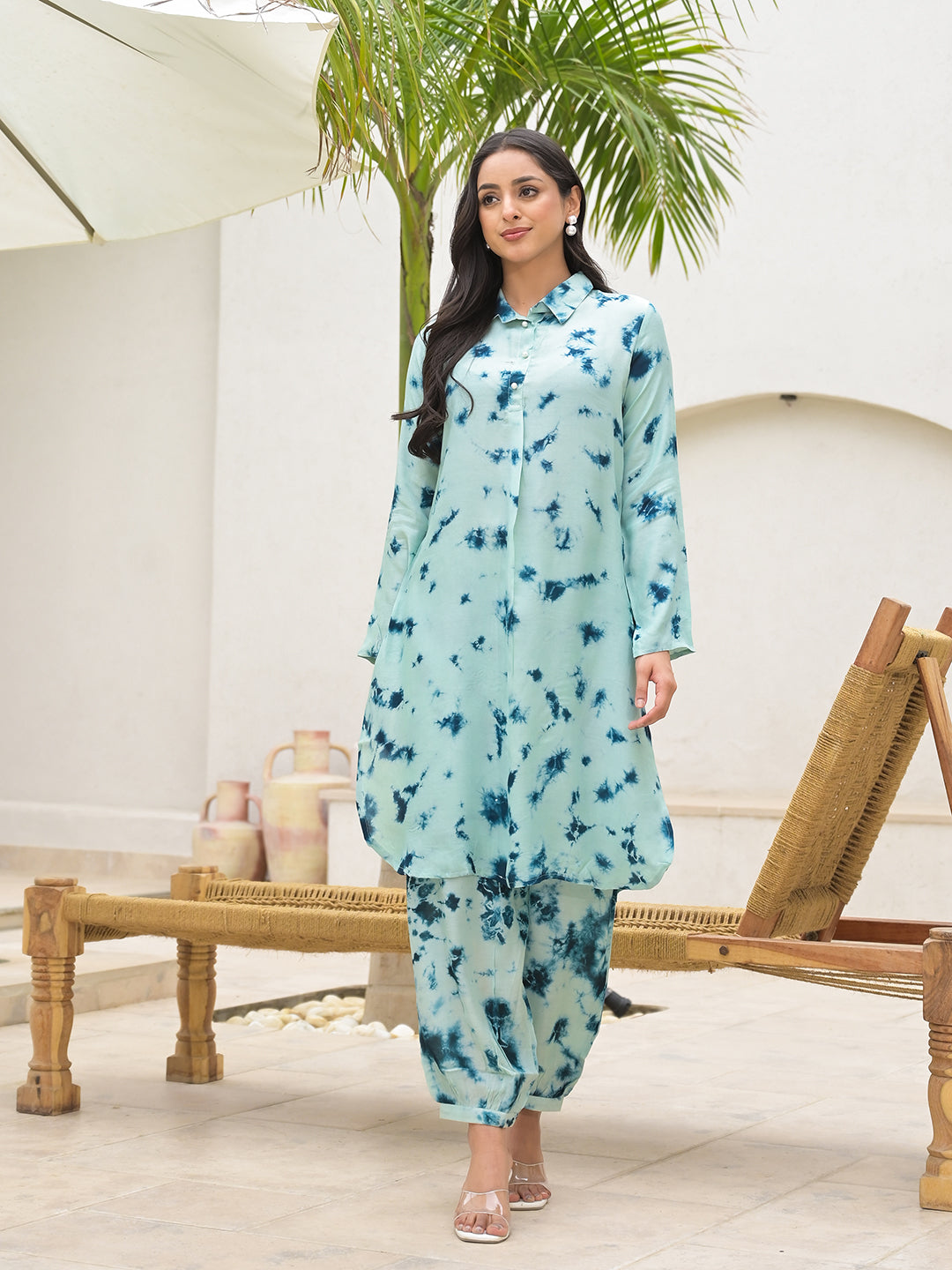 Long-sleeved tie-dye maxi dress in light blue and navy tones.