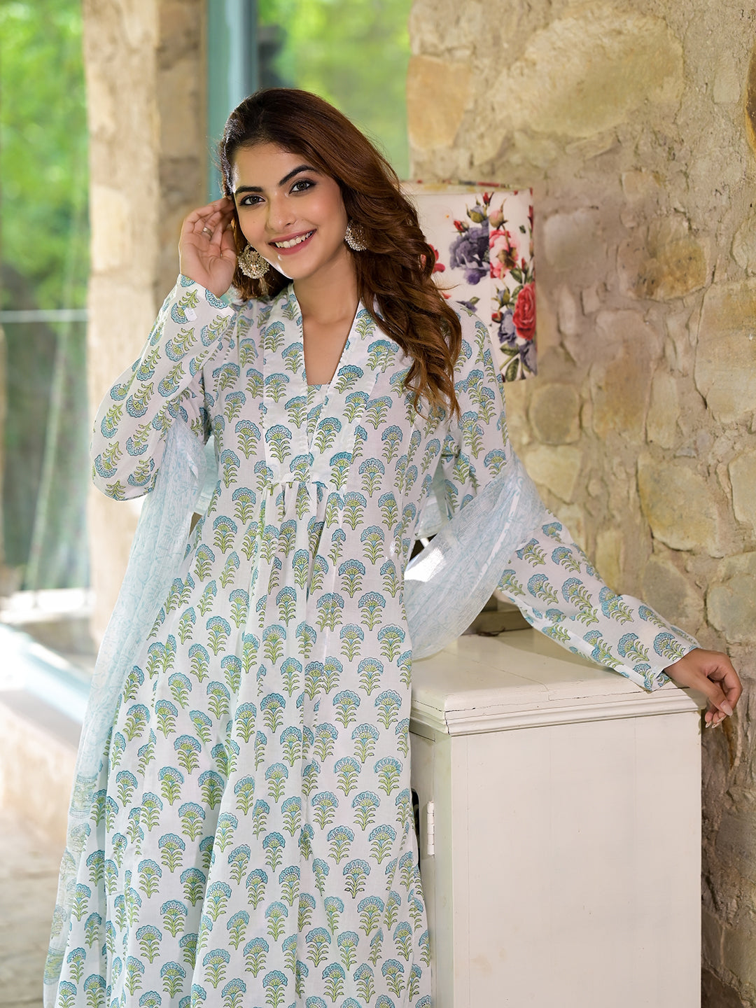 Woman in white patterned long-sleeved dress from Green Floral Handblock Printed Cotton Anarkali