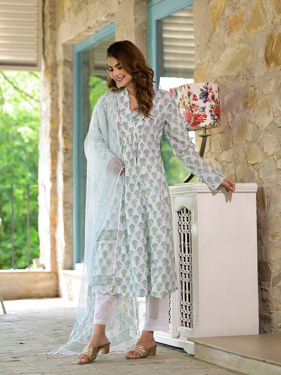 Pale blue and white floral patterned salwar kameez in Green Floral Handblock style