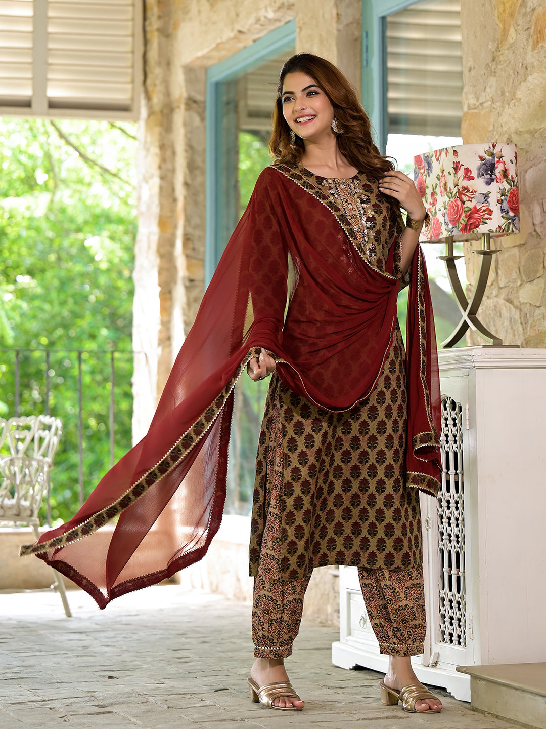 Woman in a Brown Straight Fit Zardozi Work Knee Long Cotton Kurta Set with Maroon Dupatta