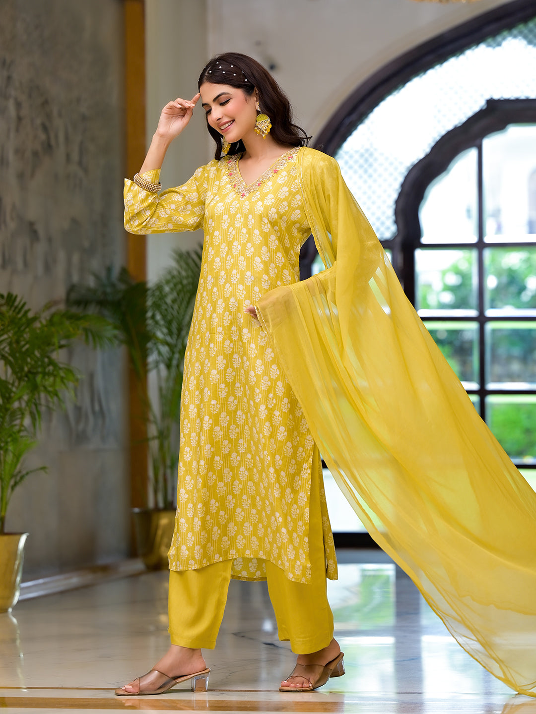 Bright yellow printed muslin straight kurta with gold embroidery and flowing dupatta