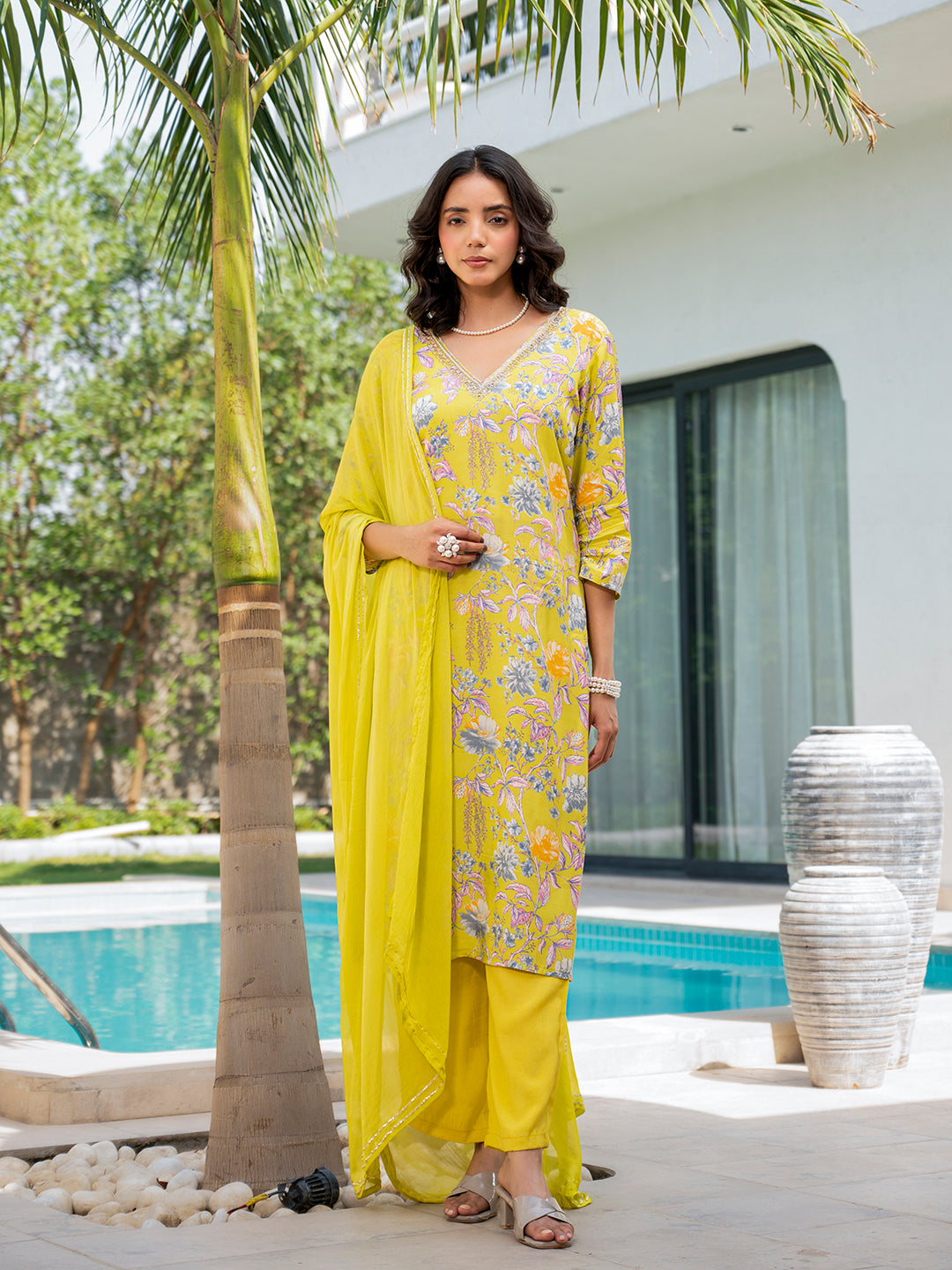 Vibrant Yellow Embroidered Floral Print Muslin Kurta Set worn by a woman