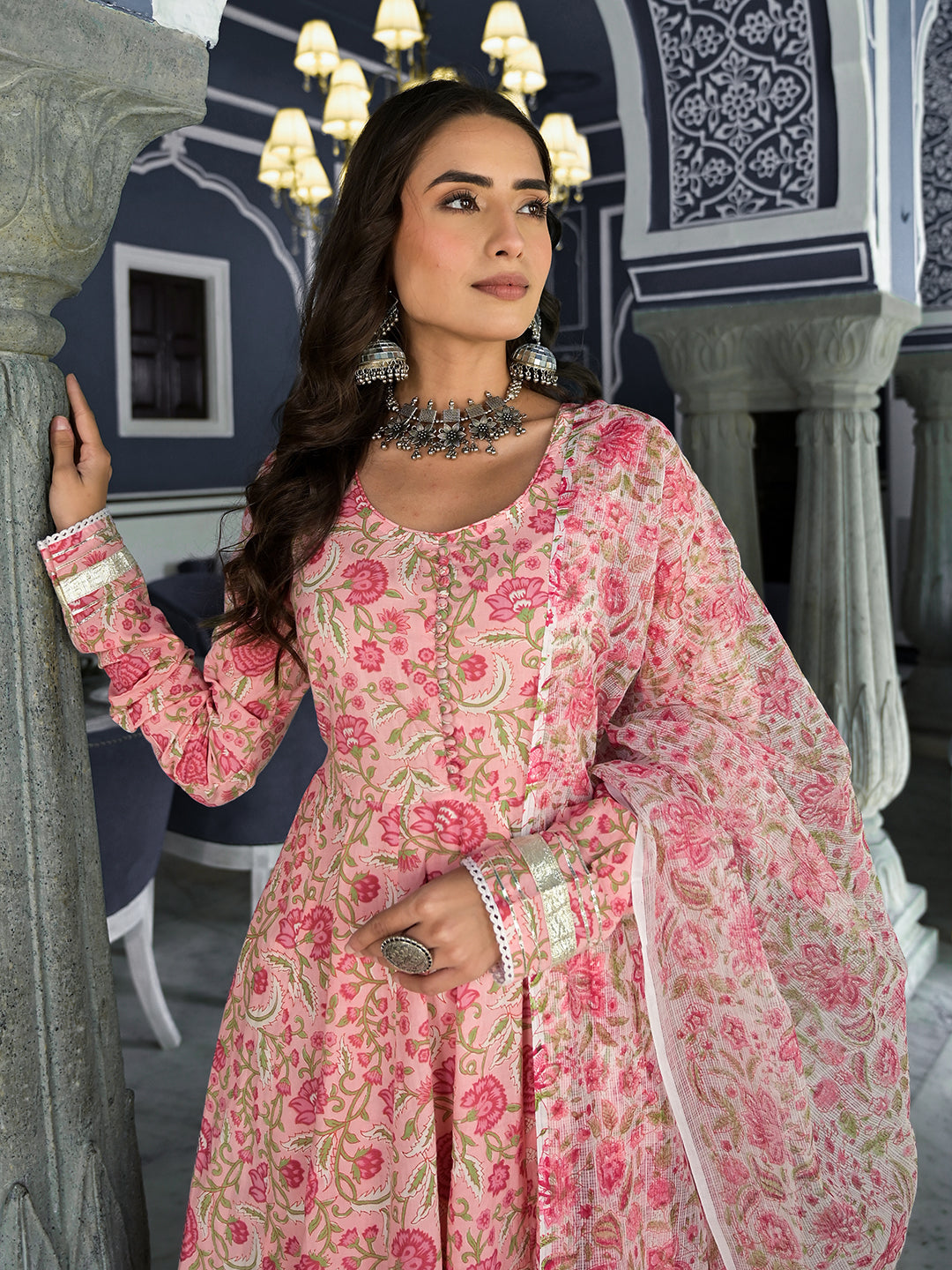 Woman in a Pink Floral Hand Block Printed Anarkali Kurta Trouser with Dupatta Set