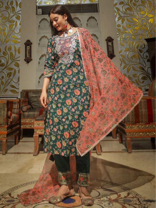 Ornate green floral printed kurta pant set with matching pink shawl displayed elegantly